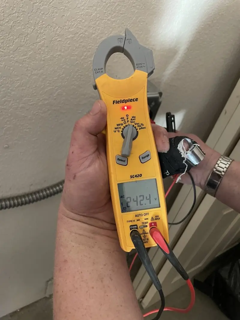 Voltage testing with clamp meter during Circuit Breaker Repair in Franklin